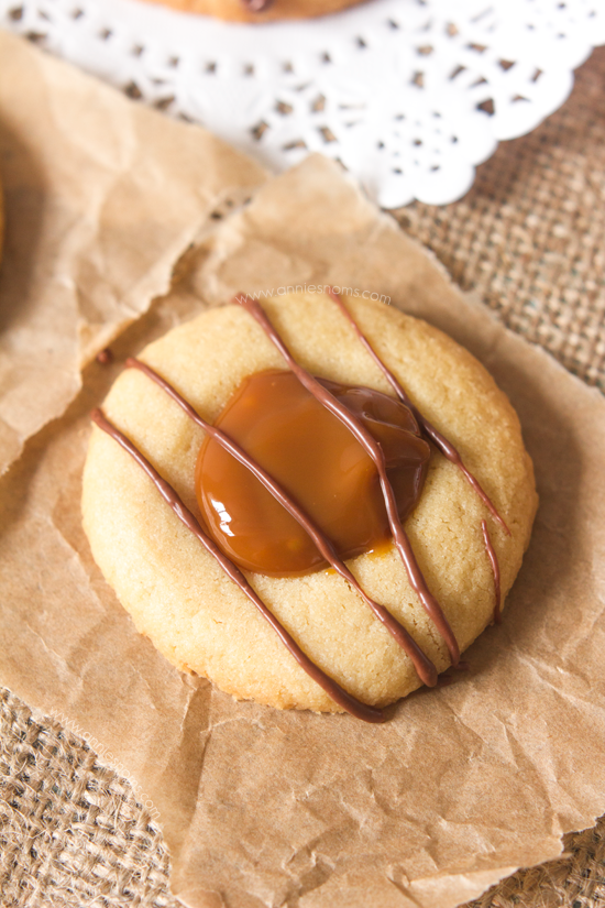 These thumbprint cookies marry crisp, buttery cookie dough, sweet, rich dulce de leche and melted chocolate to create tiny little bites of heaven!