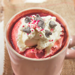 This velvety smooth Red Velvet Hot Chocolate is topped with sweetened whipped cream and chocolate to make a satisfying, rich beverage for this Valentine's Day!
