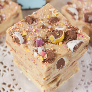 This super simple Mini Egg Fudge only has 5 ingredients, yet is melt in your mouth good! Creamy, sweet and packed with Cadbury Mini Eggs, it's the perfect Easter candy recipe!
