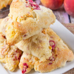 What is better than a fresh, homemade scone for breakfast? A homemade Peach and Raspberry Scone! Light, flaky, buttery and filled with fruit, these are the perfect start to your day!