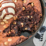 This chewy and decadent Double Chocolate Skillet Brownie is the stuff dreams are made of! Gooey, fudgy and packed with chocolate, it's heaven in every bite!
