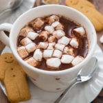 Rich and creamy Gingerbread Hot Chocolate spiked with all the very best gingerbread spices. The perfect festive drink!