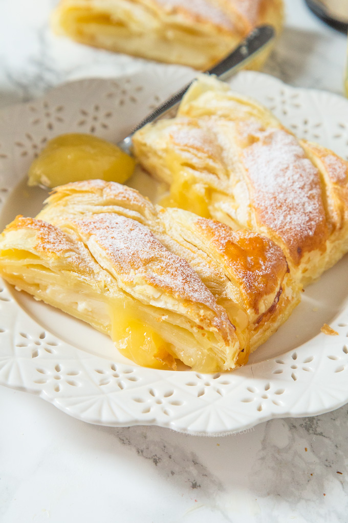 This Lemon Cream Cheese braid is ready in under 30 minutes! Flaky pastry filled with lemon curd and cream cheese to create a sweet, yet tart dessert everyone will love!
