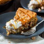 Soft and chewy cookie dough filled with butterscotch and white chocolate chips. Baked until golden and served with ice cream, this skillet cookie is almost too good to share!