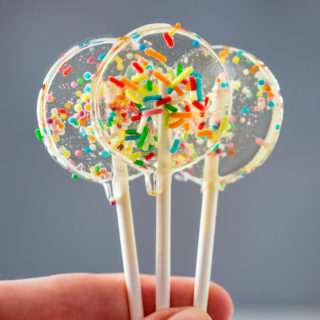 These Sprinkle Lollipops are quick to make and filled with sugar strands and sprinkles. They are just perfect for any celebration! #ad