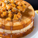 This Caramel Apple Layer Cake is Autumn in cake form! A lightly spiced cake, with sweet frosting and caramel apples piled high on top; this is one seriously delicious and easy to make showstopper! 