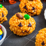 These cute little Pumpkin Rice Krispie Treats are kid friendly and so easy to make! The perfect little Halloween treats for adults and kids alike!