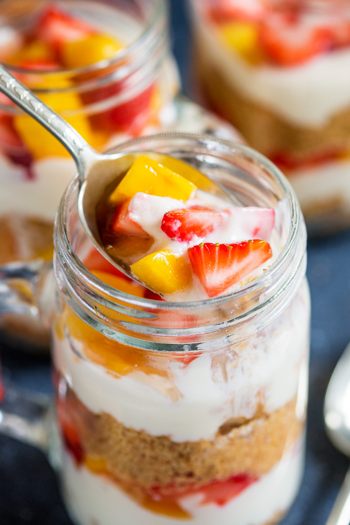 These no bake Strawberry and Mango Cheesecake Jars are the perfect individual sized dessert to make ahead and take to family gatherings!