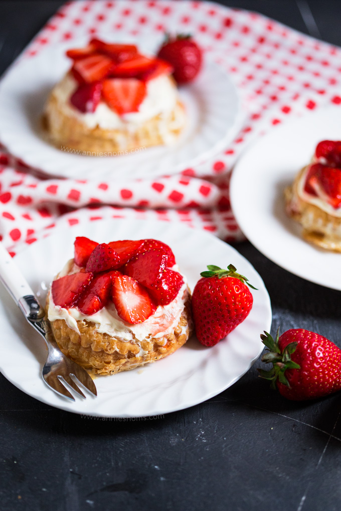 These ridiculously easy Strawberry and Clotted Cream Tarts are ready in under an hour and marry together, flaky puff pastry, sweet strawberries and thick, vanilla flavoured clotted cream; the perfect summer dessert!