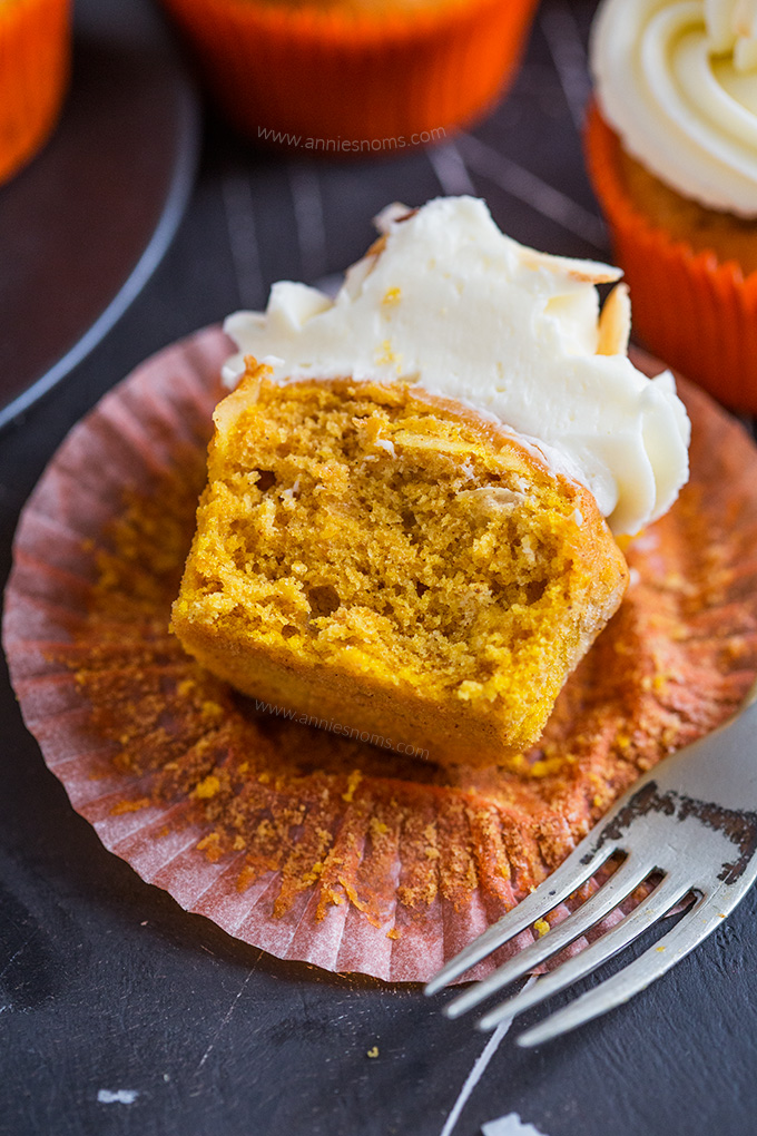 Earthy pumpkin cupcakes are given a tropical twist with coconut flakes and a creamy coconut frosting to make one seriously awesome hybrid treat with summer and autumn flavours!