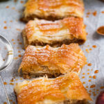 This quick and easy Apple Strudel is made with sheets of ready made filo pastry and filled with a spicy, sweet apple mixture. From prep to table in under an hour, this is perfect for feeding a crowd!