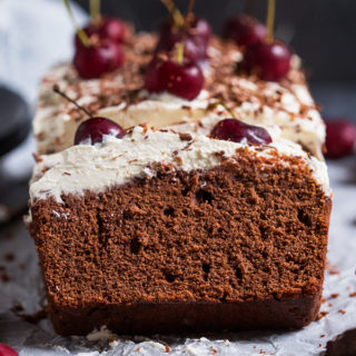 This Black Forest Loaf Cake can be made with or without alcohol and makes the perfect centrepiece for your holiday table! A rich chocolate cake with cherries and cream, it's easy to make and delicious!
