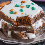 These soft and chewy Gingerbread Cookie Bars are topped with lashings of sweet cream cheese frosting and Christmas sprinkles. An easy, kid friendly festive bake you will make again and again!