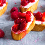 This Berry Bruschetta takes minutes to make, yet creates bite size pieces of heaven. Crisp bread, sweet cream and juicy berries are all that's required to make this nibble!