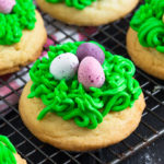 These drop sugar cookies are quick to make and decorated with buttercream and mini eggs to make them look like nests. Fun for kids and adults alike this Easter!