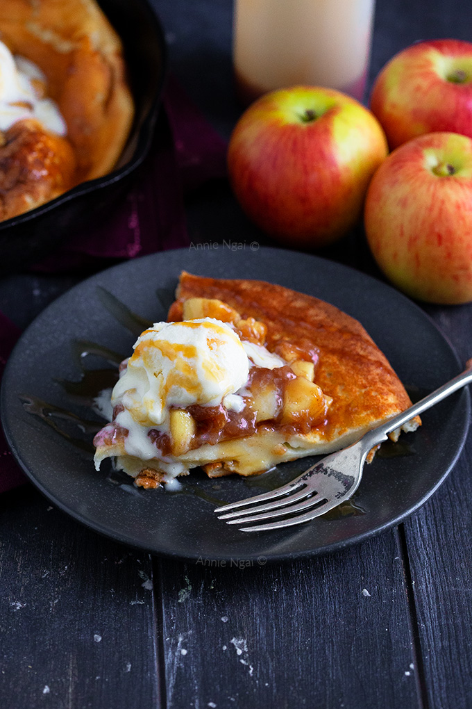 This Apple Pie Dutch Baby Pancake is easy to make and feeds a crowd! It's a hybrid between breakfast and dessert and packed full of flavour!