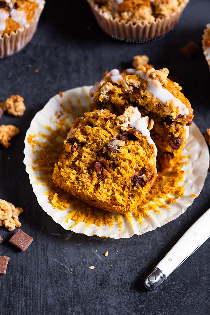 These Pumpkin Chocolate Chip Muffins are topped with a crunchy oat mixture and baked to create a soft, spiced muffin peppered with chocolate with a crunchy streusel top!