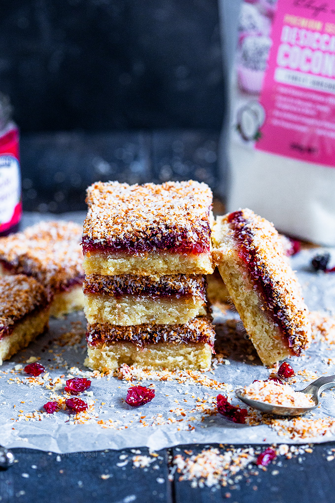 These Cranberry Coconut Bars combine a buttery shortbread base, cranberry sauce and toasted coconut to make a festive, delicious treat!