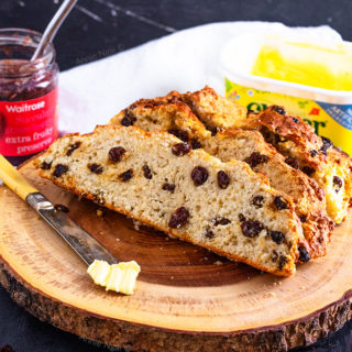 This Irish Soda Bread is so easy to make, yet tastes utterly divine. You'll find it hard not to devour the whole loaf of this soft, flavourful quick bread!