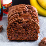 This Healthier Chocolate Banana Bread is made with whole wheat flour, agave, coconut oil and plenty of bananas. It's peppered with dark chocolate chips to create a healthier, but still delicious bread!