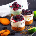 These Blackberry Lime Cheesecake Jars are no bake and quick to make. Gingernut biscuits make the base along with a mascarpone cheesecake filling. All finished off wih glossy blackberries.