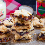 These Mincemeat Shortbread Bars are just as tasty as Mince Pies, but a cinch to make! Buttery shortbread and sweet mincemeat baked together until golden. Simple, yet divine!