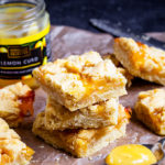These super easy to make Lemon Curd Crumble Bars only require a few ingredients, yet taste utterly divine. They are the perfect balance of sweet and tart with plenty of flavour!